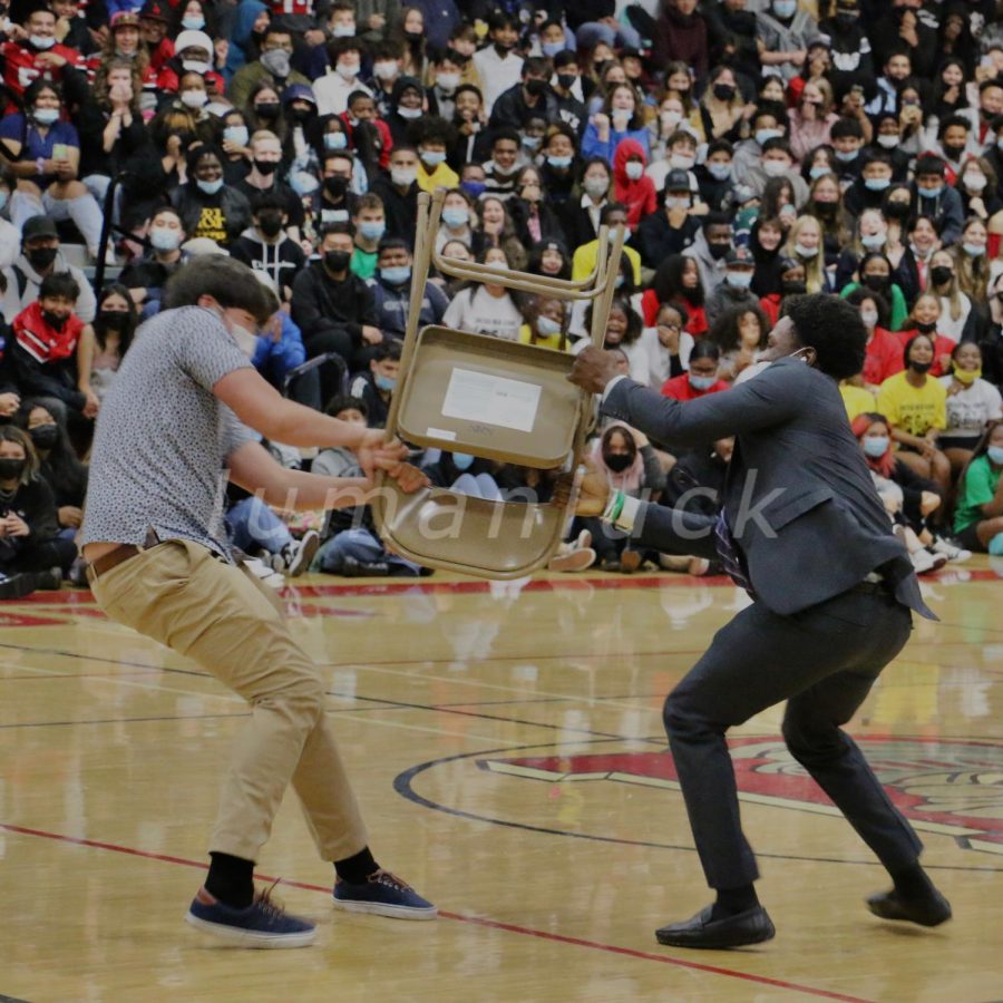 The game musical chairs ends with a one-on-one battle with Matthew Cottman (left) and Daniel Emojevbe (right).