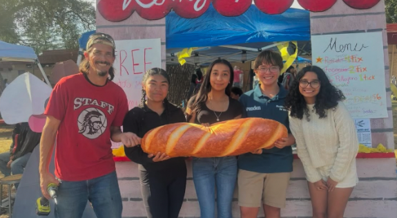 Photo of Stockton Scholars carnival booth based on the movie Ratatouille